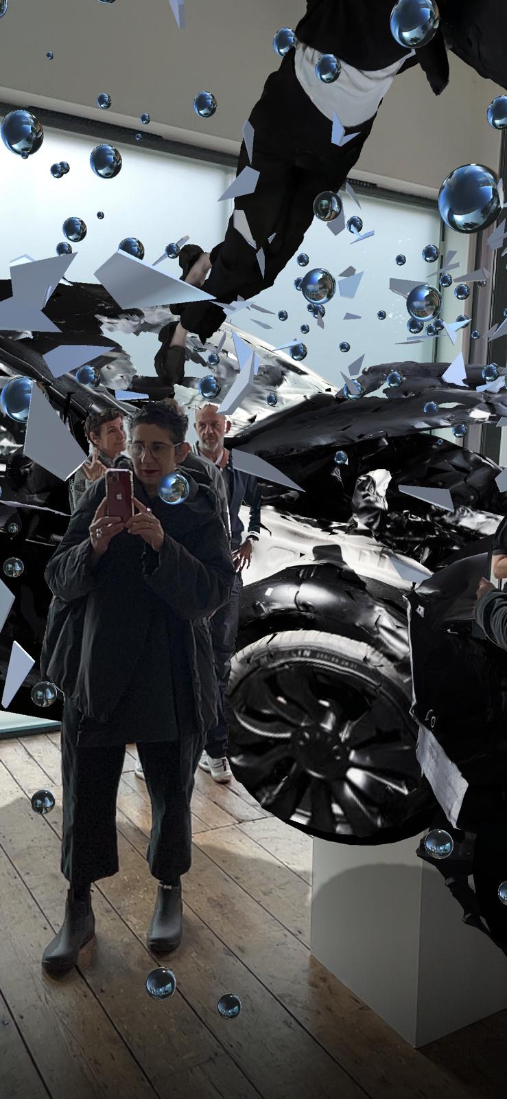 Visitors gathered at the opening, holding up their phones to see Encounter in augmented reality.